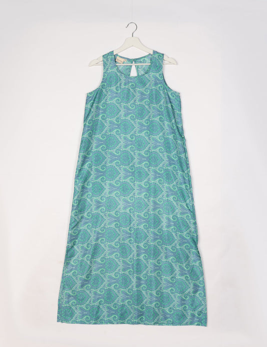 Sleeveless A-Line maxi dress made from recycled saris, showcasing eco clothing and green fashion. A chic example of upcycled women's clothing and climate neutral clothing, perfect for fans of circular fashion, carbon neutral fashion, and products made from textile waste.