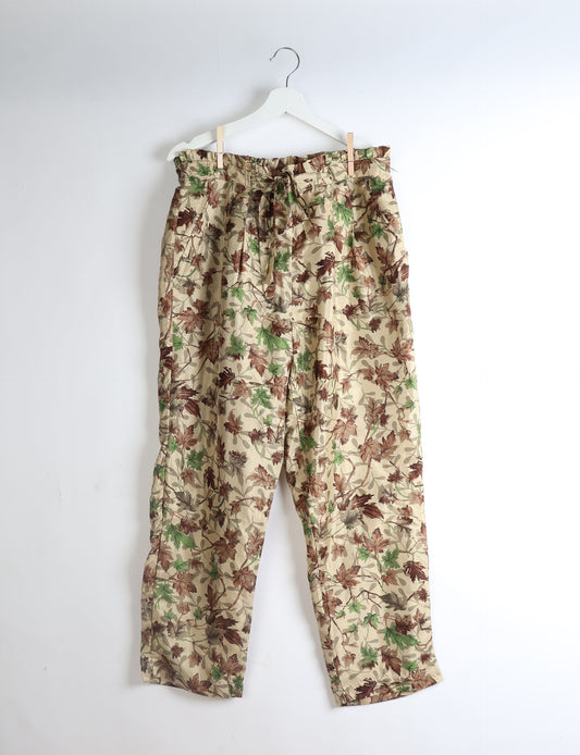 Paperbag high waisted pull-on pants for women made from upcycled garments and recycled fabric, featuring eco clothing design with an elasticated waistband and side pockets. A beautiful example of sustainable women’s clothing and environmentally friendly clothing inspired by upcycling fashion and green fashion movements.