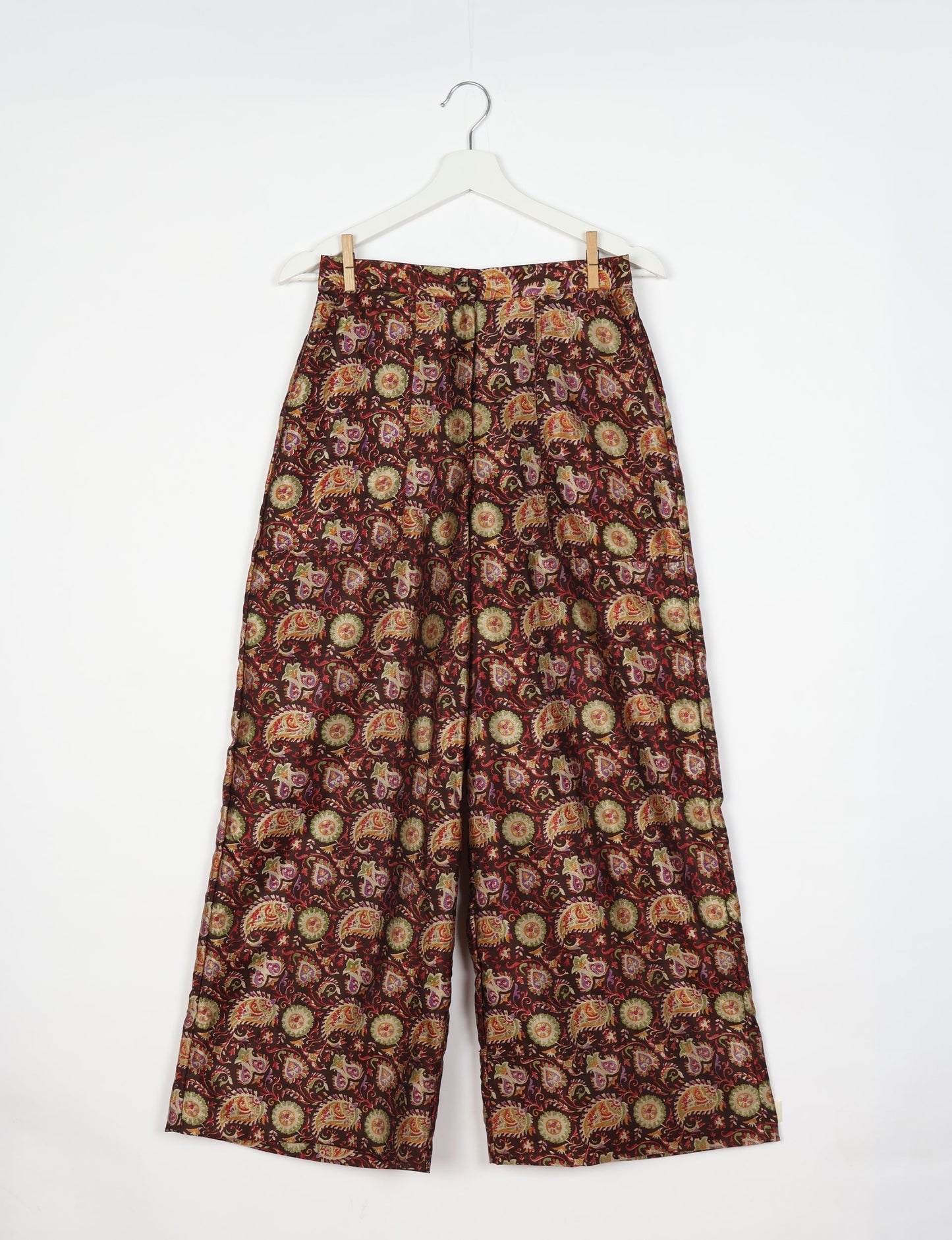 Upcycled women’s wide leg pants made from preloved saris, showcasing eco friendly clothes, zero waste clothing, and carbon neutral fashion.