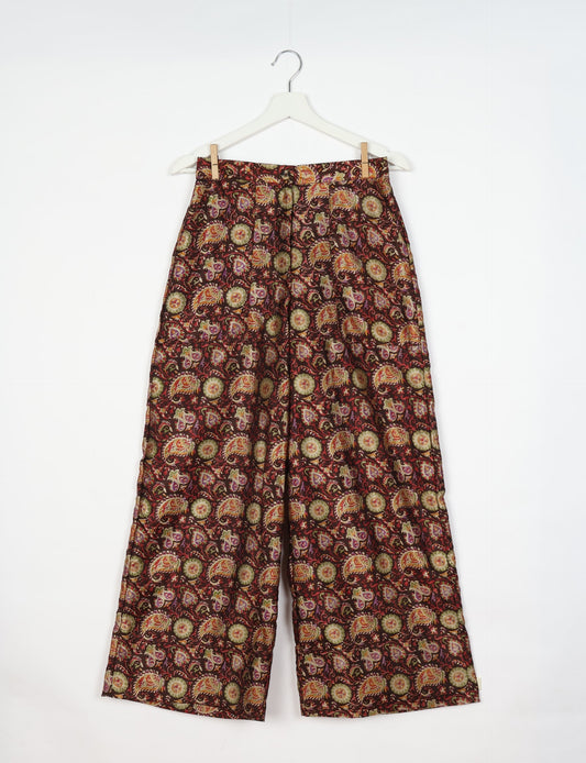 Upcycled women’s wide leg pants made from preloved saris, showcasing eco friendly clothes, zero waste clothing, and carbon neutral fashion.