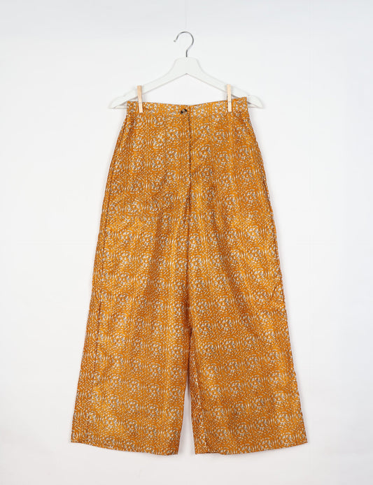 Upcycled women’s wide leg pants made from preloved saris, showcasing eco friendly clothes, zero waste clothing, and carbon neutral fashion.