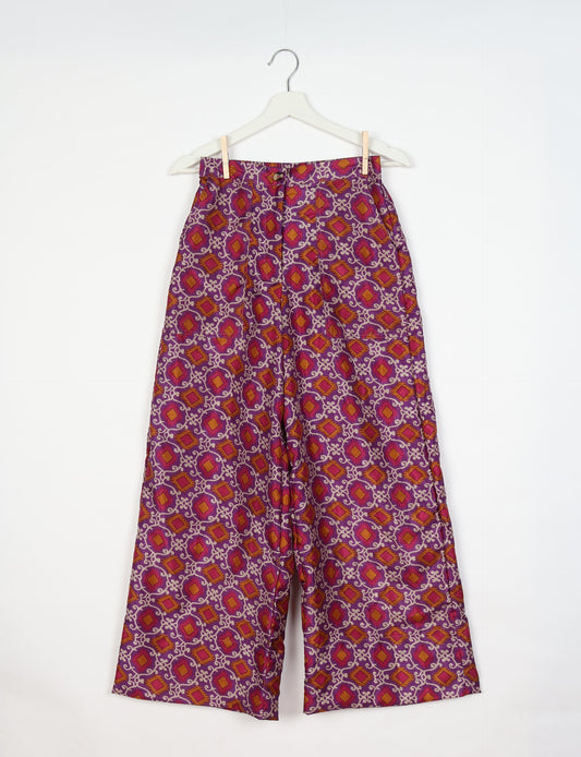 Upcycled women’s wide leg pants made from preloved saris, showcasing eco friendly clothes, zero waste clothing, and carbon neutral fashion.