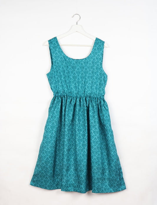 Upcycled women’s fit and flare dress made from recycled sari products, showcasing environment friendly clothing and green fashion design — an eco clothing choice for conscious clothing lovers and sustainable women’s fashion enthusiasts.