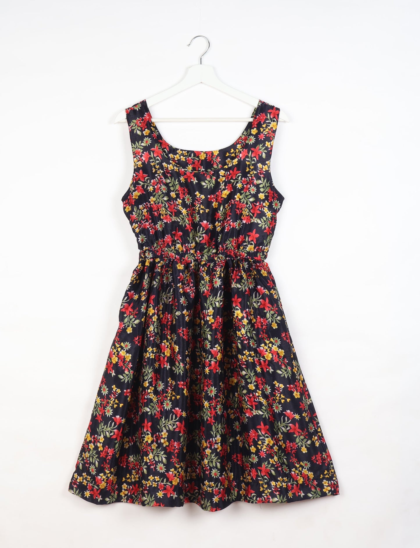 Upcycled women’s fit and flare dress made from recycled sari products, showcasing environment friendly clothing and green fashion design — an eco clothing choice for conscious clothing lovers and sustainable women’s fashion enthusiasts.