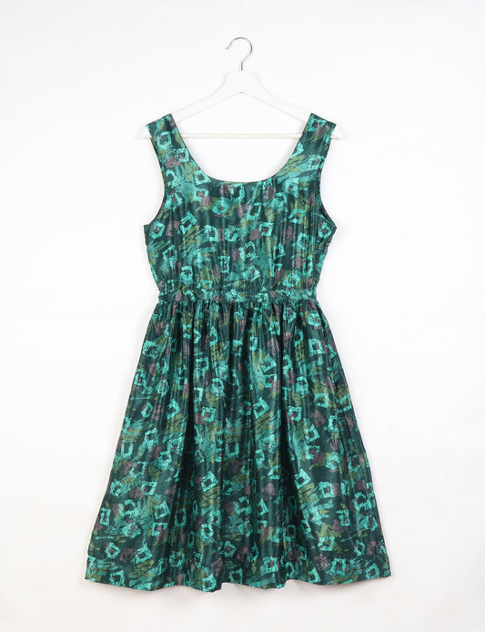 Upcycled women’s fit and flare dress made from recycled sari products, showcasing environment friendly clothing and green fashion design — an eco clothing choice for conscious clothing lovers and sustainable women’s fashion enthusiasts.