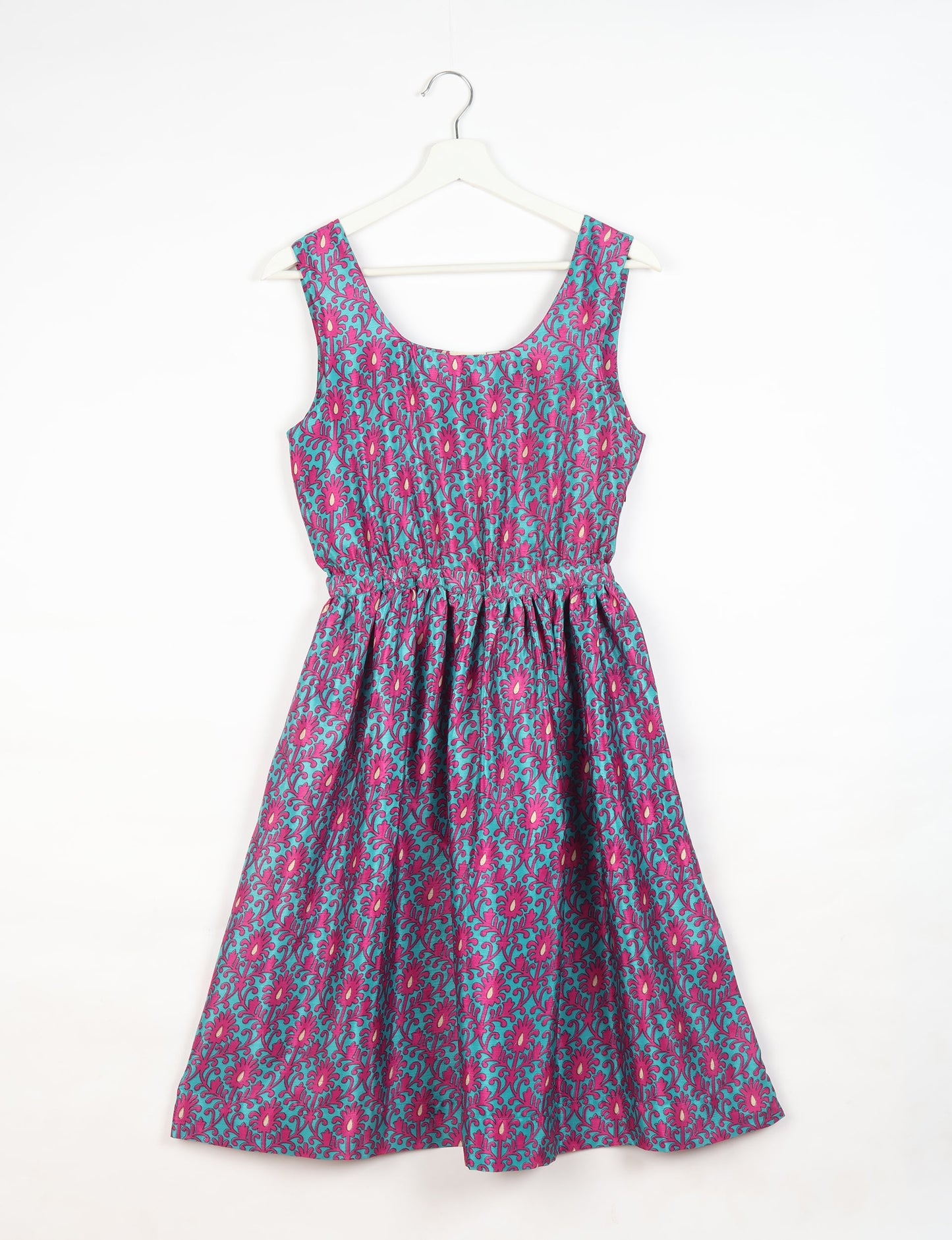 Upcycled women’s fit and flare dress made from recycled sari products, showcasing environment friendly clothing and green fashion design — an eco clothing choice for conscious clothing lovers and sustainable women’s fashion enthusiasts.