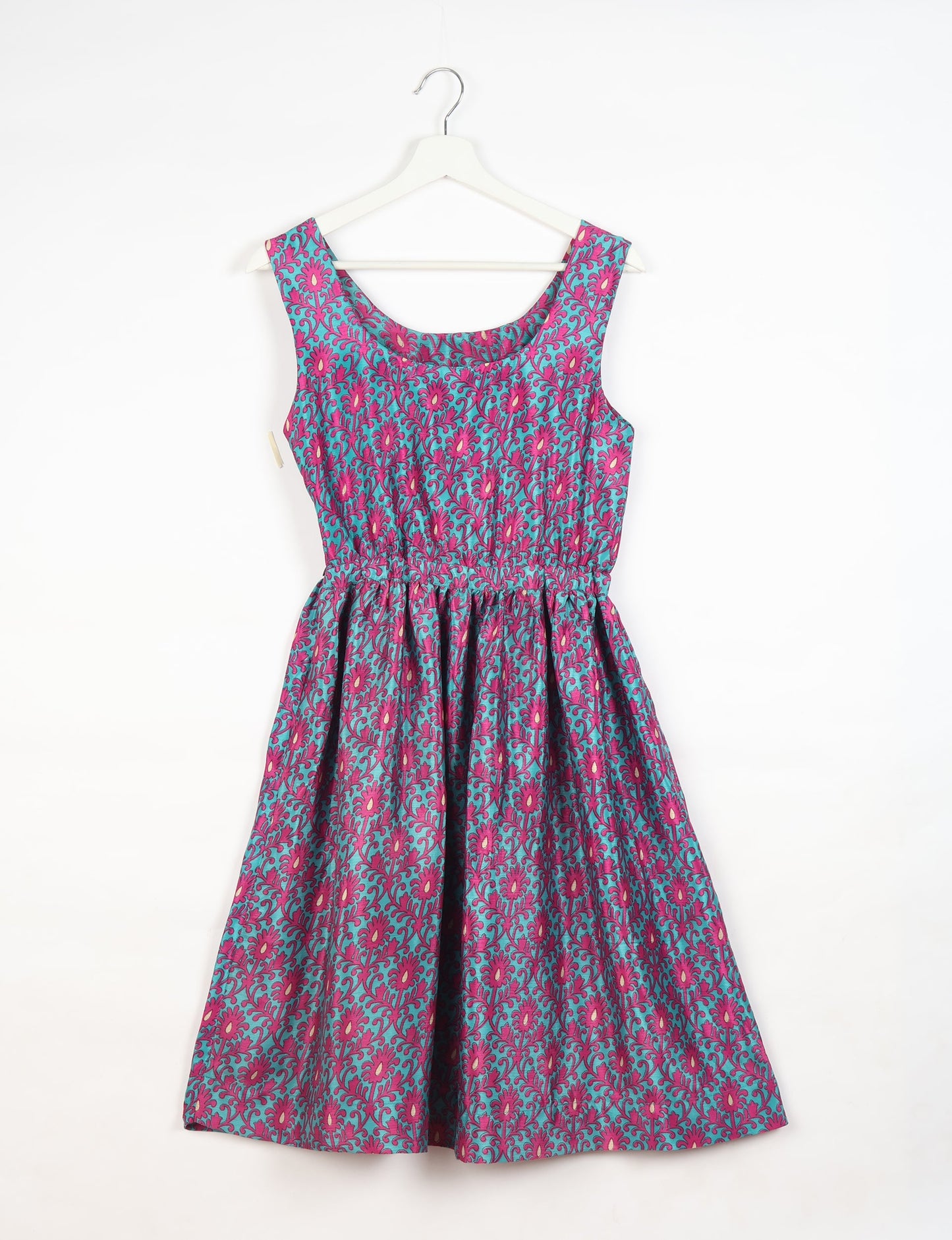 Upcycled women’s fit and flare dress made from recycled sari products, showcasing environment friendly clothing and green fashion design — an eco clothing choice for conscious clothing lovers and sustainable women’s fashion enthusiasts.