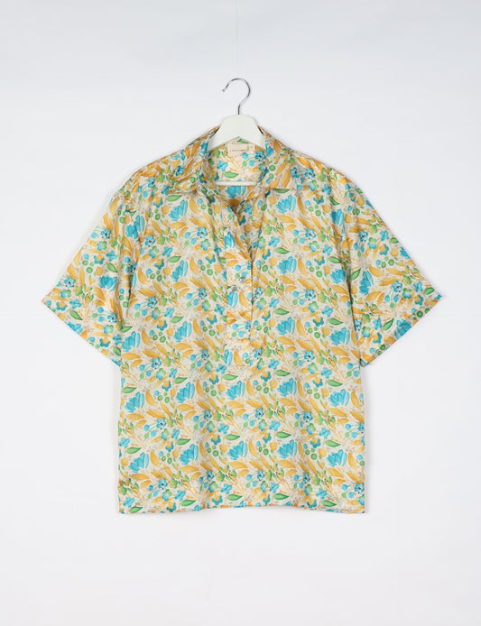 Oversized shirt made from recycled sari fabric, reflecting eco friendly fashion, repurposed clothing, and earth friendly clothing for conscious wardrobes.