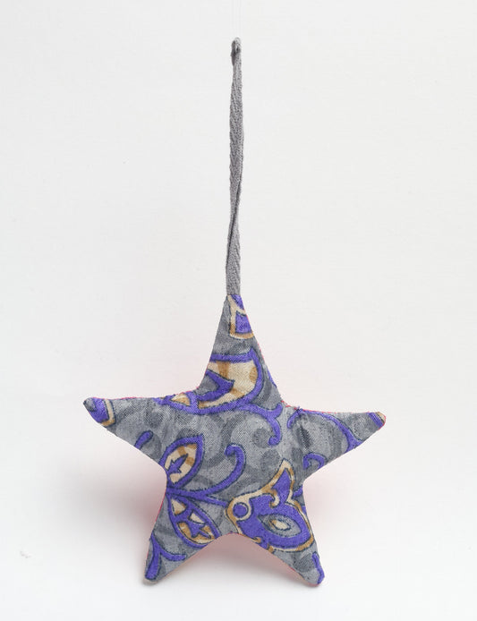 Hand-stitched mini star bauble made from recycled sari products, showcasing upcycled clothing techniques and eco friendly fashion. A lightweight festive accessory promoting conscious clothing, organic clothing, and sustainable women’s clothing crafted from recycled material clothing.