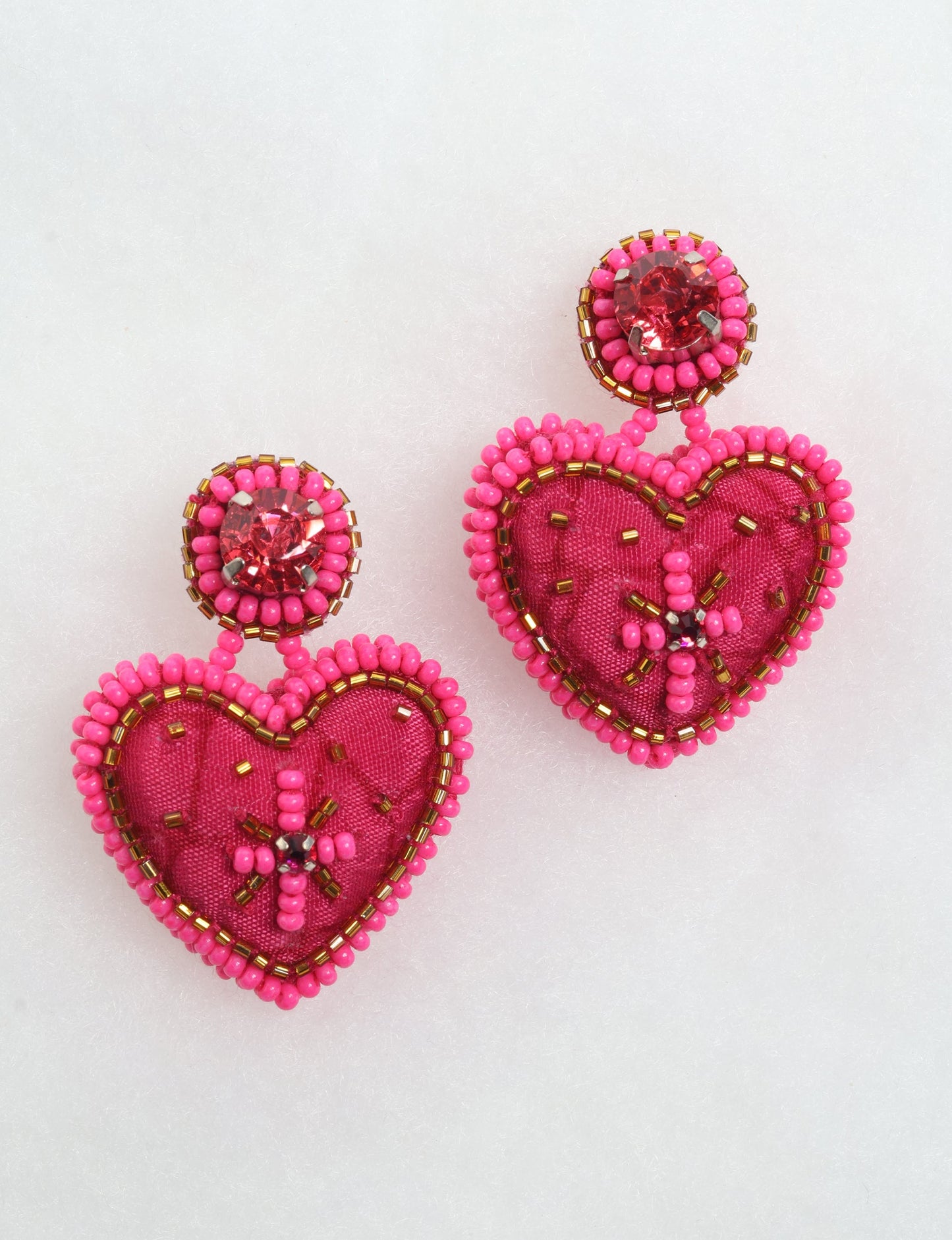 Hand-embroidered Heart Drop Earrings featuring intricate Aari stitching, crafted from recycled sari fabric. A stunning blend of upcycled clothing, ethical fashion, and circular fashion, these earrings embrace recycled sustainable fashion and earth-friendly clothing for a truly elegant, eco-conscious choice.