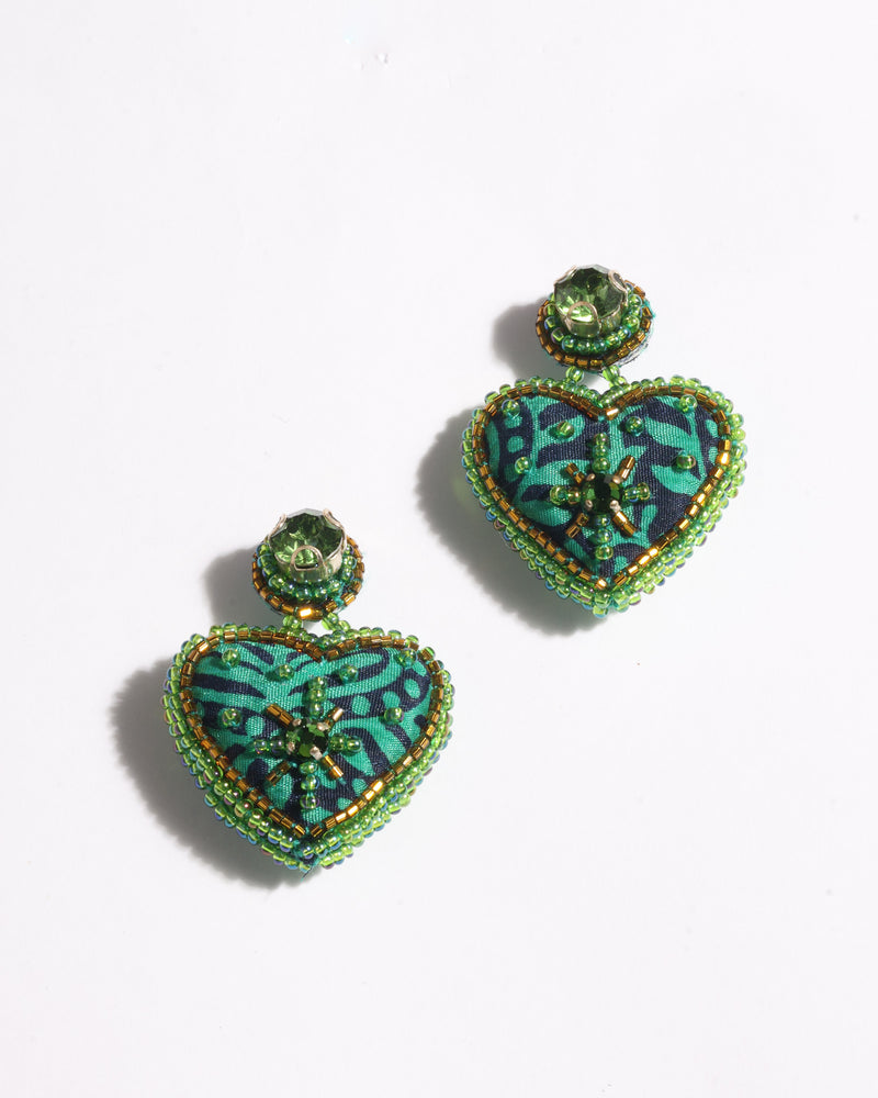 Green tropical heart drop earrings with fabric pattern, green beads, and rhinestone studs, shown flat on white background