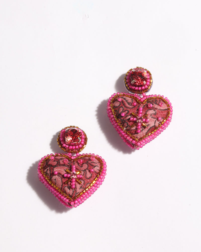 Pink tropical heart drop earrings with bead and sequin embellishments, shown flat on white background