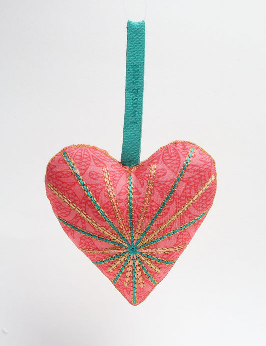 Timeless Heart ornament made from upcycled clothing and recycled fabric, filled with organic cotton and hand-finished with vibrant silk and metallic thread. An eco-friendly, carbon neutral fashion piece that supports green fashion and fair trade apparel.