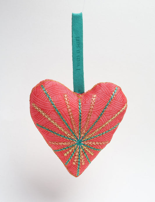 Timeless Heart ornament made from upcycled clothing and recycled fabric, filled with organic cotton and hand-finished with vibrant silk and metallic thread. An eco-friendly, carbon neutral fashion piece that supports green fashion and fair trade apparel.