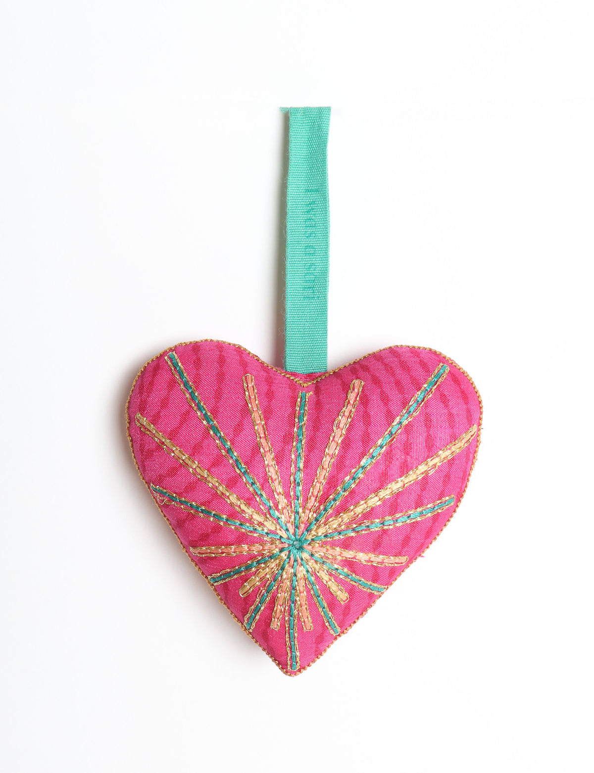 Timeless Heart ornament made from upcycled clothing and recycled fabric, filled with organic cotton and hand-finished with vibrant silk and metallic thread. An eco-friendly, carbon neutral fashion piece that supports green fashion and fair trade apparel.
