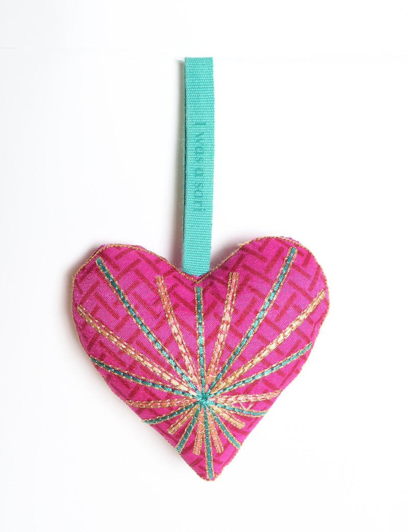 Timeless Heart ornament made from upcycled clothing and recycled fabric, filled with organic cotton and hand-finished with vibrant silk and metallic thread. An eco-friendly, carbon neutral fashion piece that supports green fashion and fair trade apparel.
