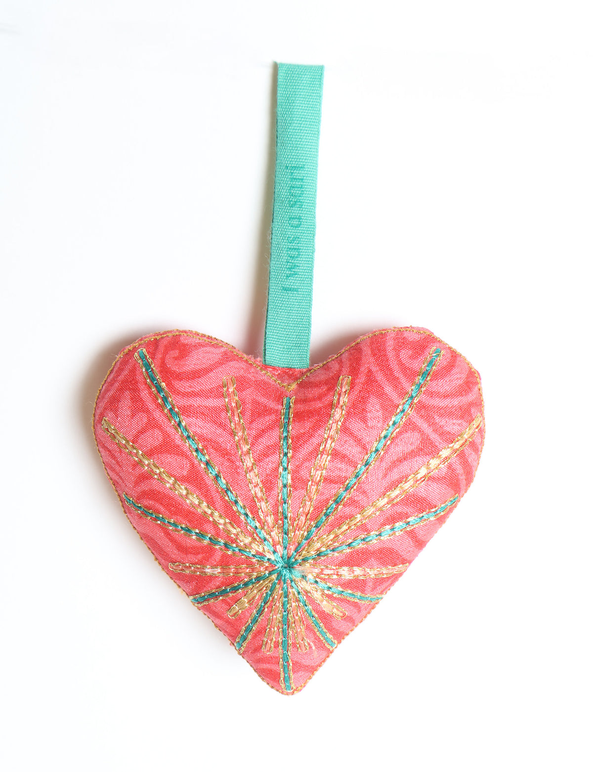 Timeless Heart ornament made from upcycled clothing and recycled fabric, filled with organic cotton and hand-finished with vibrant silk and metallic thread. An eco-friendly, carbon neutral fashion piece that supports green fashion and fair trade apparel.