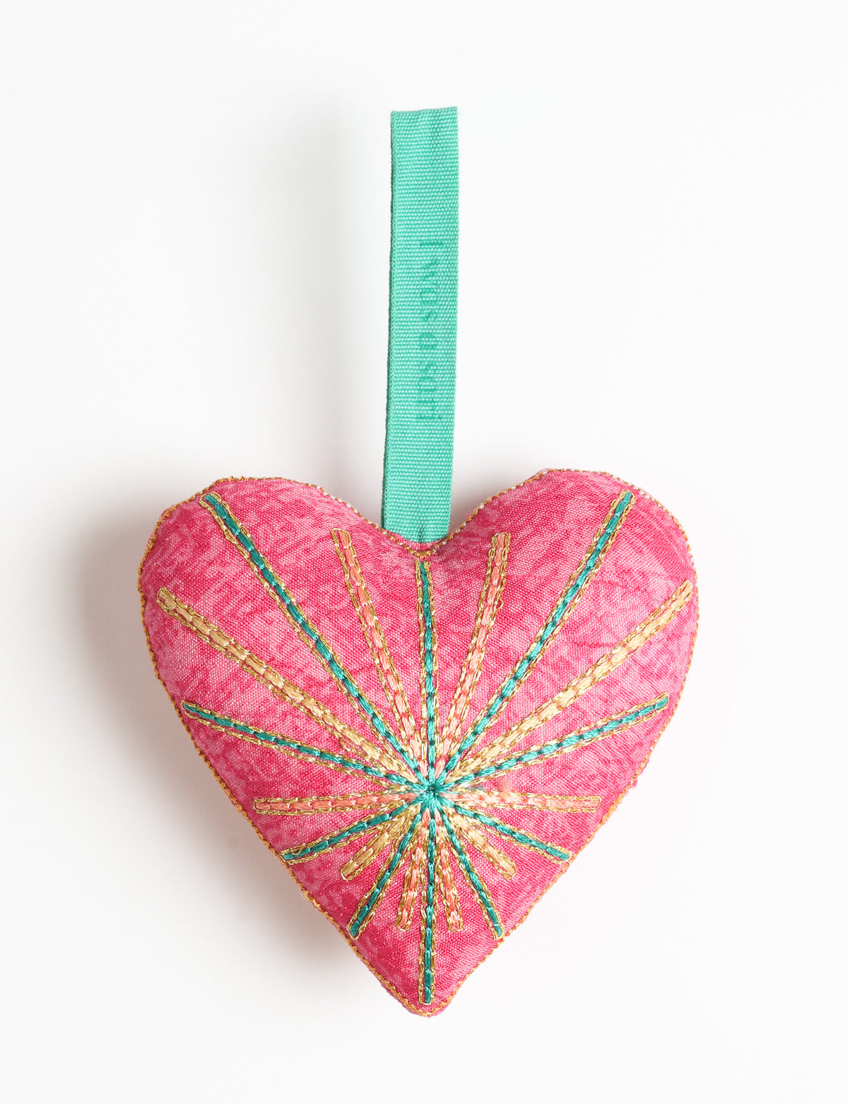 Timeless Heart ornament made from upcycled clothing and recycled fabric, filled with organic cotton and hand-finished with vibrant silk and metallic thread. An eco-friendly, carbon neutral fashion piece that supports green fashion and fair trade apparel.