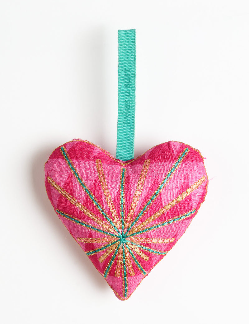 Timeless Heart ornament made from upcycled clothing and recycled fabric, filled with organic cotton and hand-finished with vibrant silk and metallic thread. An eco-friendly, carbon neutral fashion piece that supports green fashion and fair trade apparel.