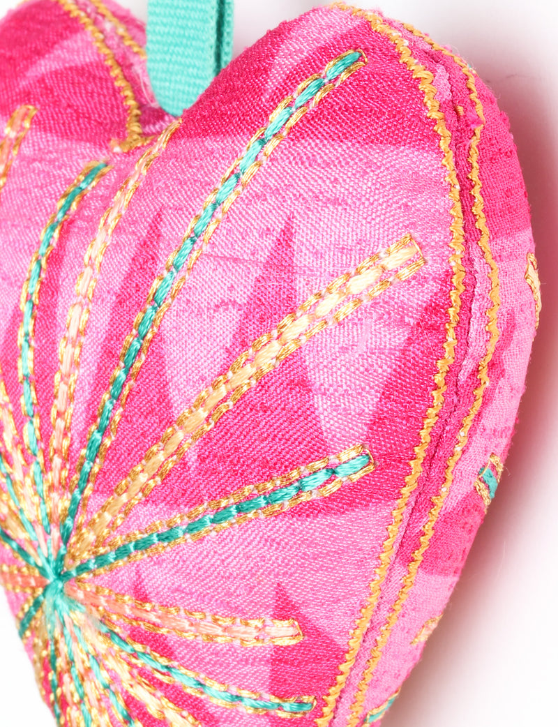 Timeless Heart ornament made from upcycled clothing and recycled fabric, filled with organic cotton and hand-finished with vibrant silk and metallic thread. An eco-friendly, carbon neutral fashion piece that supports green fashion and fair trade apparel.