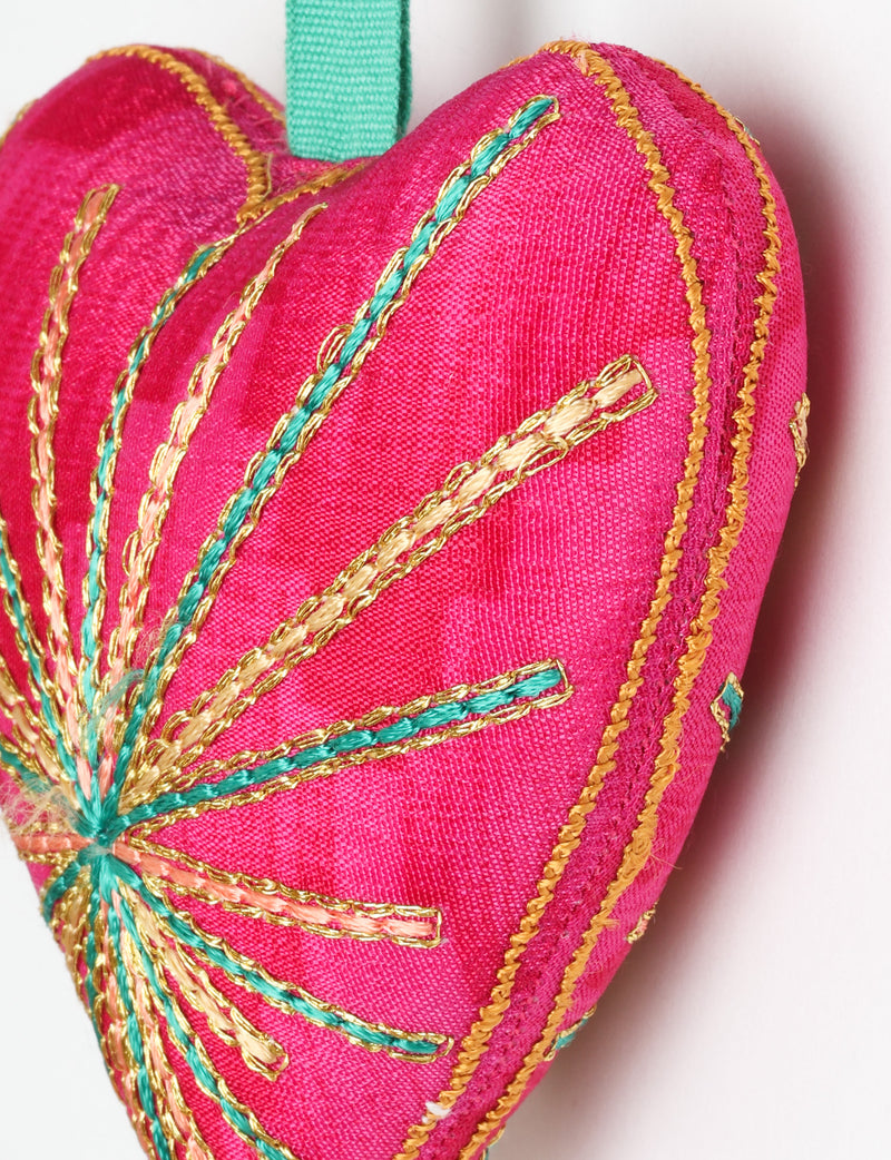 Timeless Heart ornament made from upcycled clothing and recycled fabric, filled with organic cotton and hand-finished with vibrant silk and metallic thread. An eco-friendly, carbon neutral fashion piece that supports green fashion and fair trade apparel.