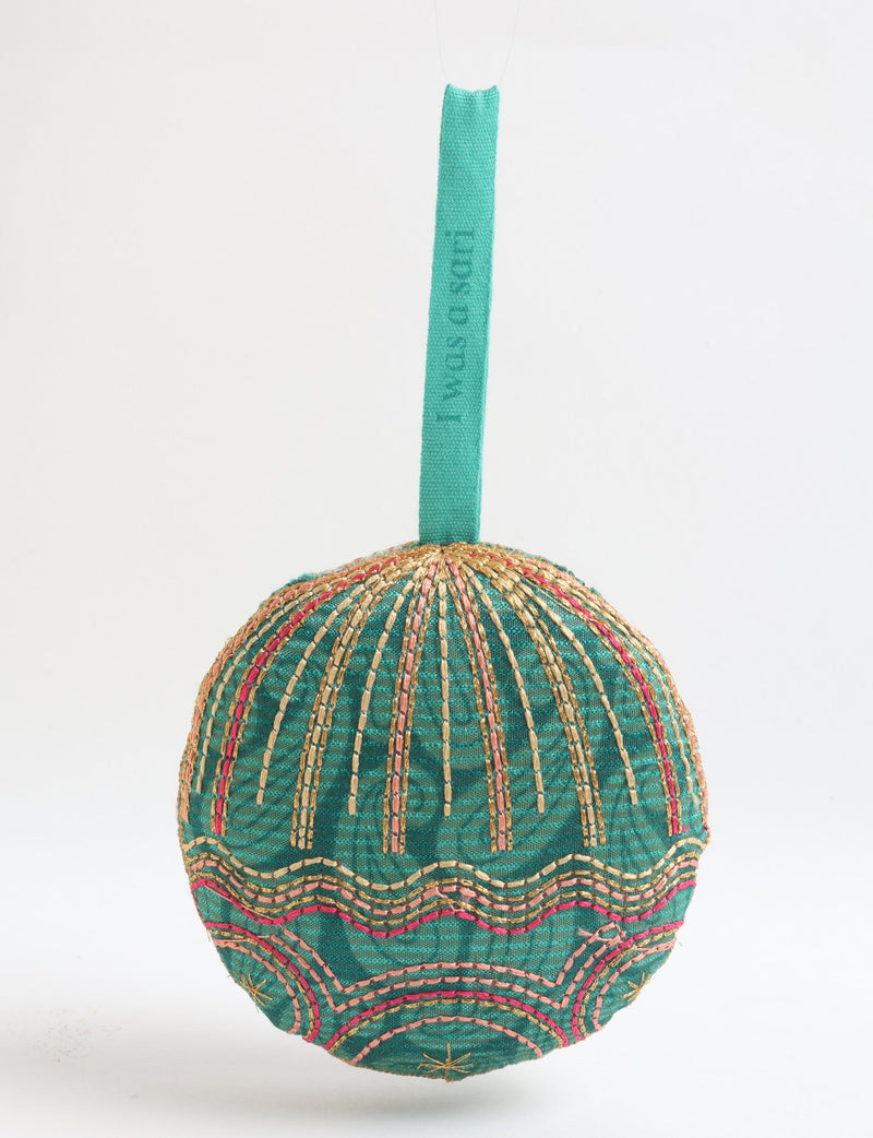 Green paisley full moon ornament with gold and pink stitched embroidery and a teal hanging loop with text