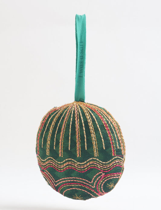 Timeless Full Moon ornament handmade from recycled sari fabric, featuring organic cotton filling and gold thread embroidery — a beautiful piece of upcycled clothing, eco clothing, and sustainable women’s fashion made from repurposed materials.