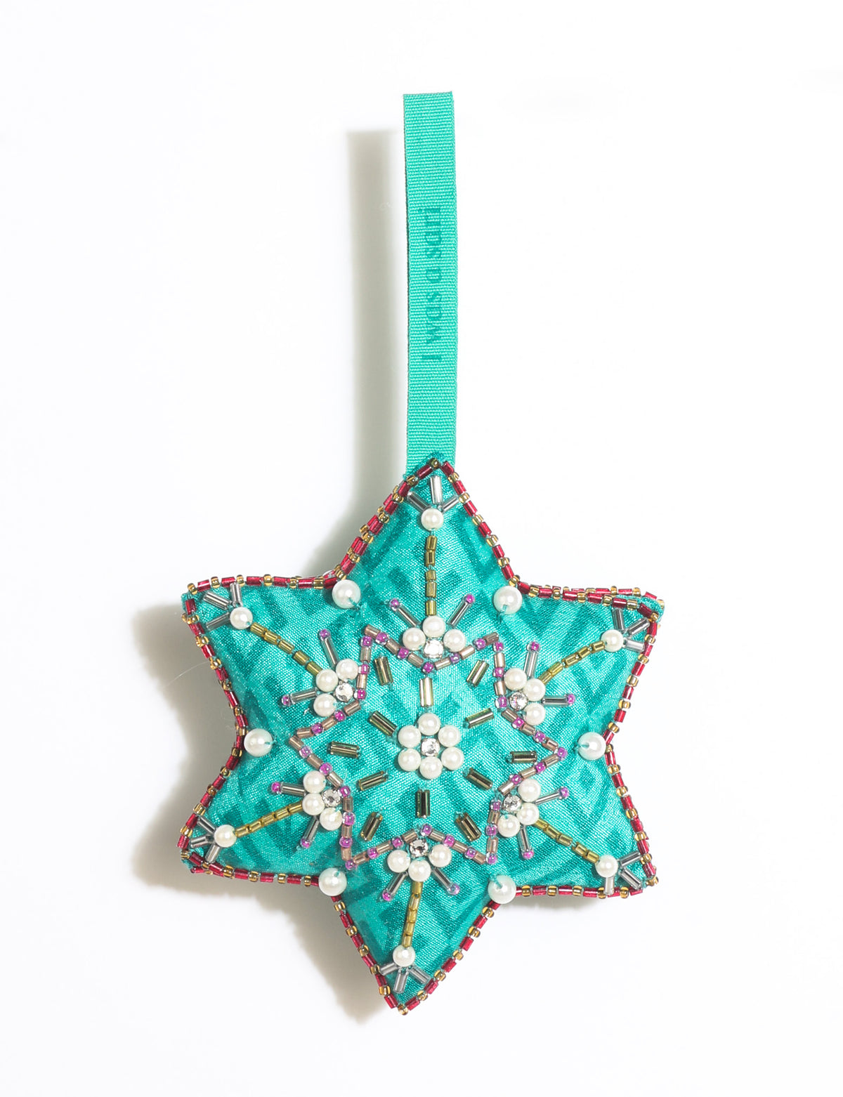 Teal fabric star-shaped snowflake ornament with bead and pearl embellishments, hanging by a teal fabric loop