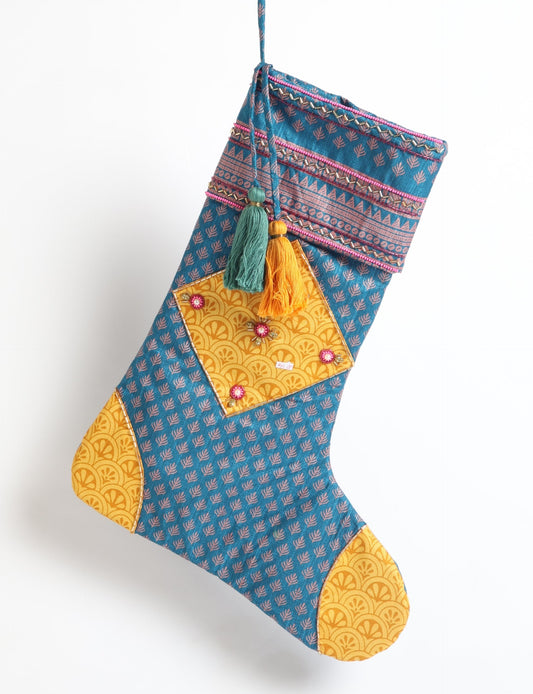 Cheer Christmas stocking made from recycled sari fabric with patchwork, gold hand embroidery, stones, sequins, pearls, glass beads, heart charm, and tassel — upcycled women’s clothing, conscious clothing, green fashion, upcycling fashion, environmentally friendly clothing, products made from textile waste, repurposed clothing, carbon neutral fashion, eco clothing, natural clothing.
