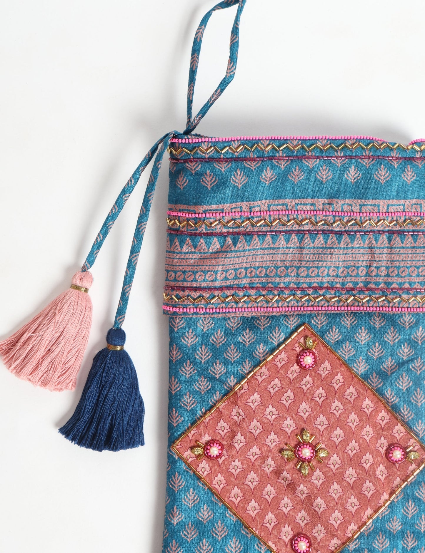 Cheer Christmas stocking made from recycled sari fabric with patchwork, gold hand embroidery, stones, sequins, pearls, glass beads, heart charm, and tassel — upcycled women’s clothing, conscious clothing, green fashion, upcycling fashion, environmentally friendly clothing, products made from textile waste, repurposed clothing, carbon neutral fashion, eco clothing, natural clothing.