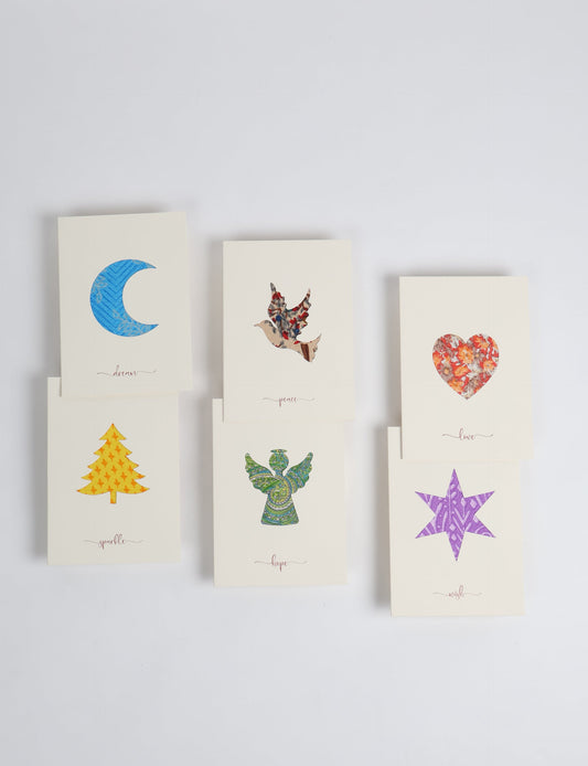Folded greeting card set of 6 made from recycled sari scraps, symbolising Wish, Hope, Sparkle, Love, Peace, and Dream — beautifully designed with repurposed clothing textiles, upcycled garments, circular fashion inspiration, and fair trade fashion aesthetics, reflecting environmentally friendly clothing values.