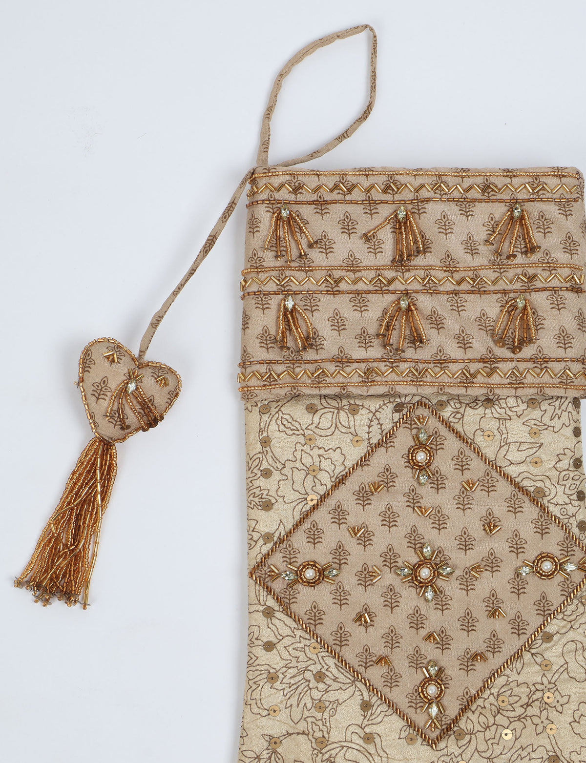 Beige patchwork Christmas stocking with gold bead tassels, sequins, floral and geometric embroidery, and a hanging loop