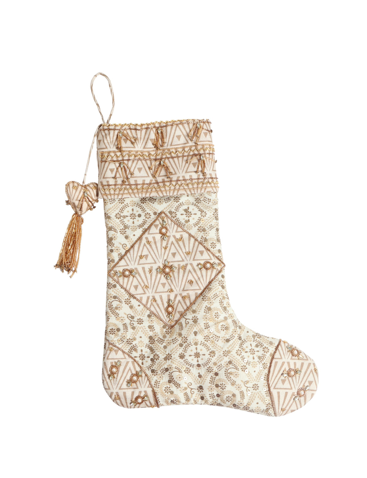 Beige patchwork Christmas stocking with leaf and geometric patterns, bead embellishments, and a hanging loop with tassel charm