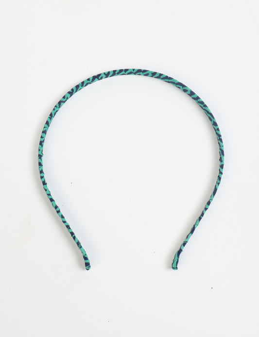 Thin fabric-wrapped metal hairband for a clean and stylish everyday look