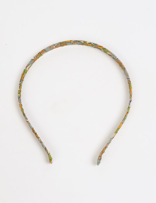 Thin fabric-wrapped metal hairband for a clean and stylish everyday look