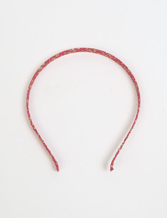Thin fabric-wrapped metal hairband for a clean and stylish everyday look
