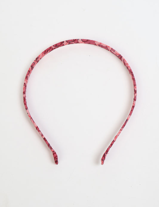 Thin fabric-wrapped metal hairband for a clean and stylish everyday look