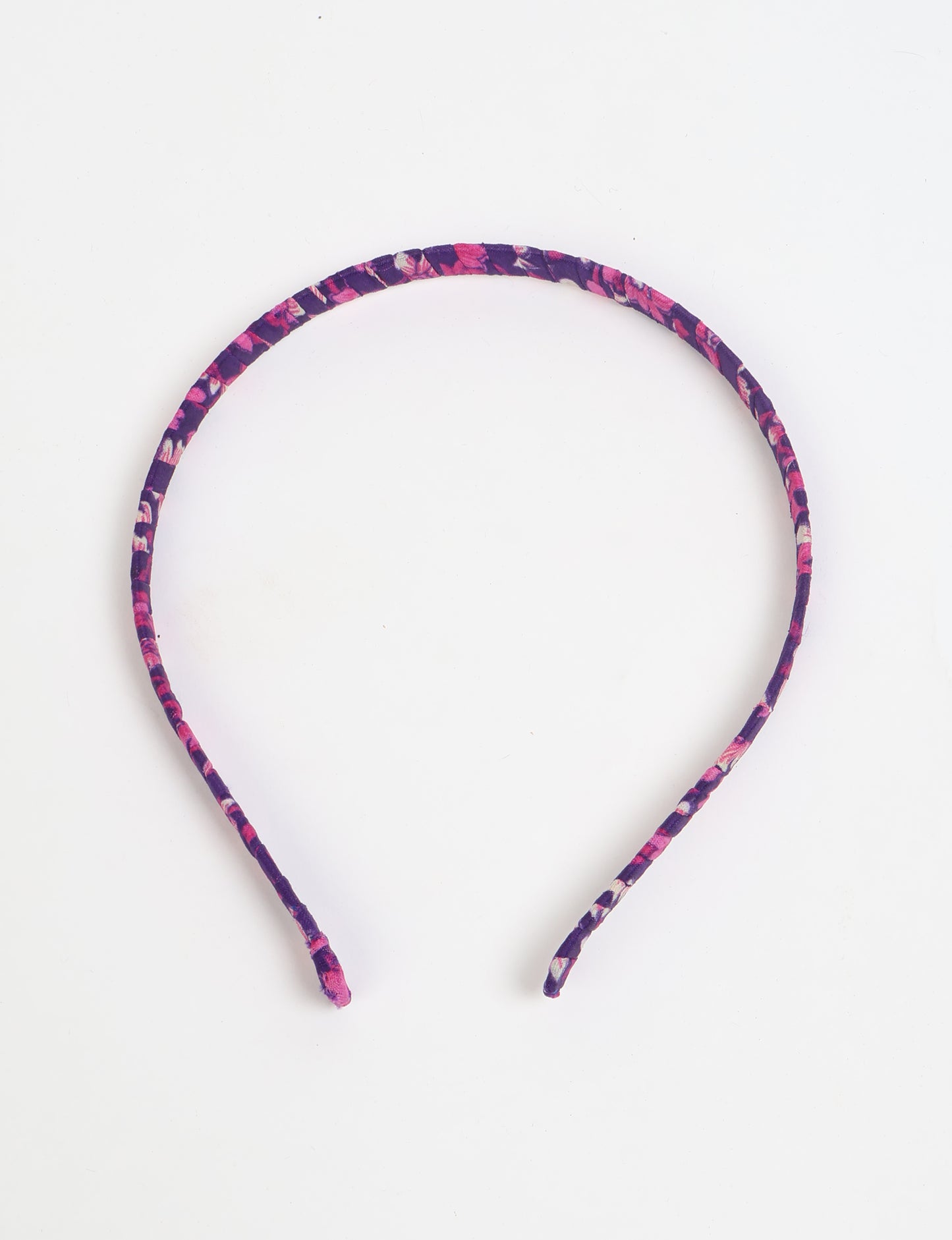 Thin fabric-wrapped metal hairband for a clean and stylish everyday look