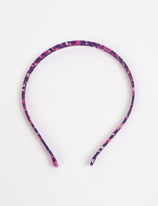 Thin fabric-wrapped metal hairband for a clean and stylish everyday look