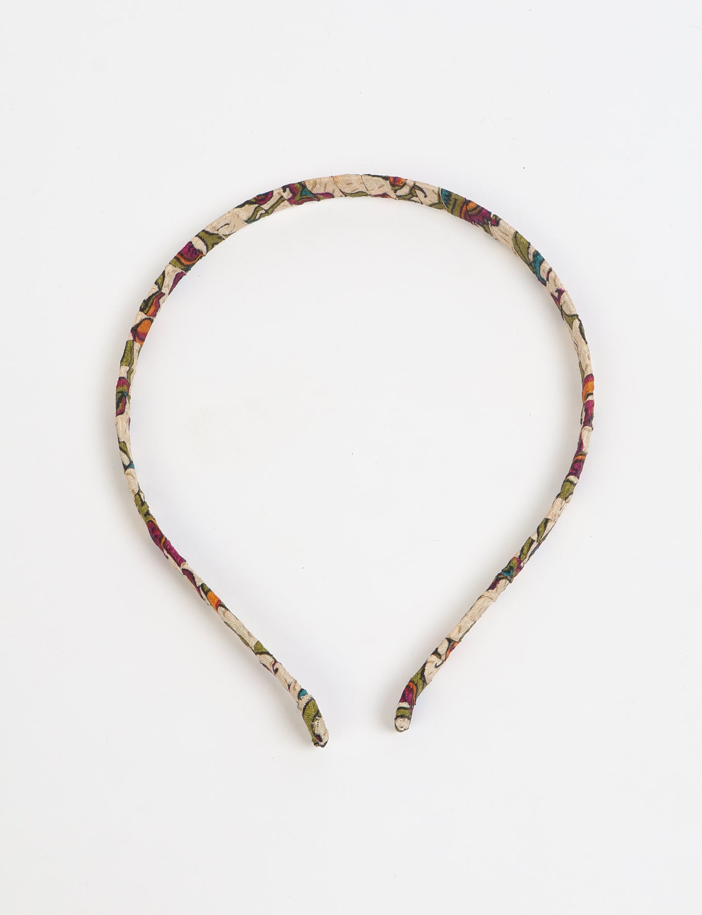 Thin fabric-wrapped metal hairband for a clean and stylish everyday look
