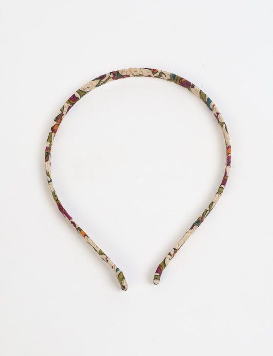 Thin fabric-wrapped metal hairband for a clean and stylish everyday look