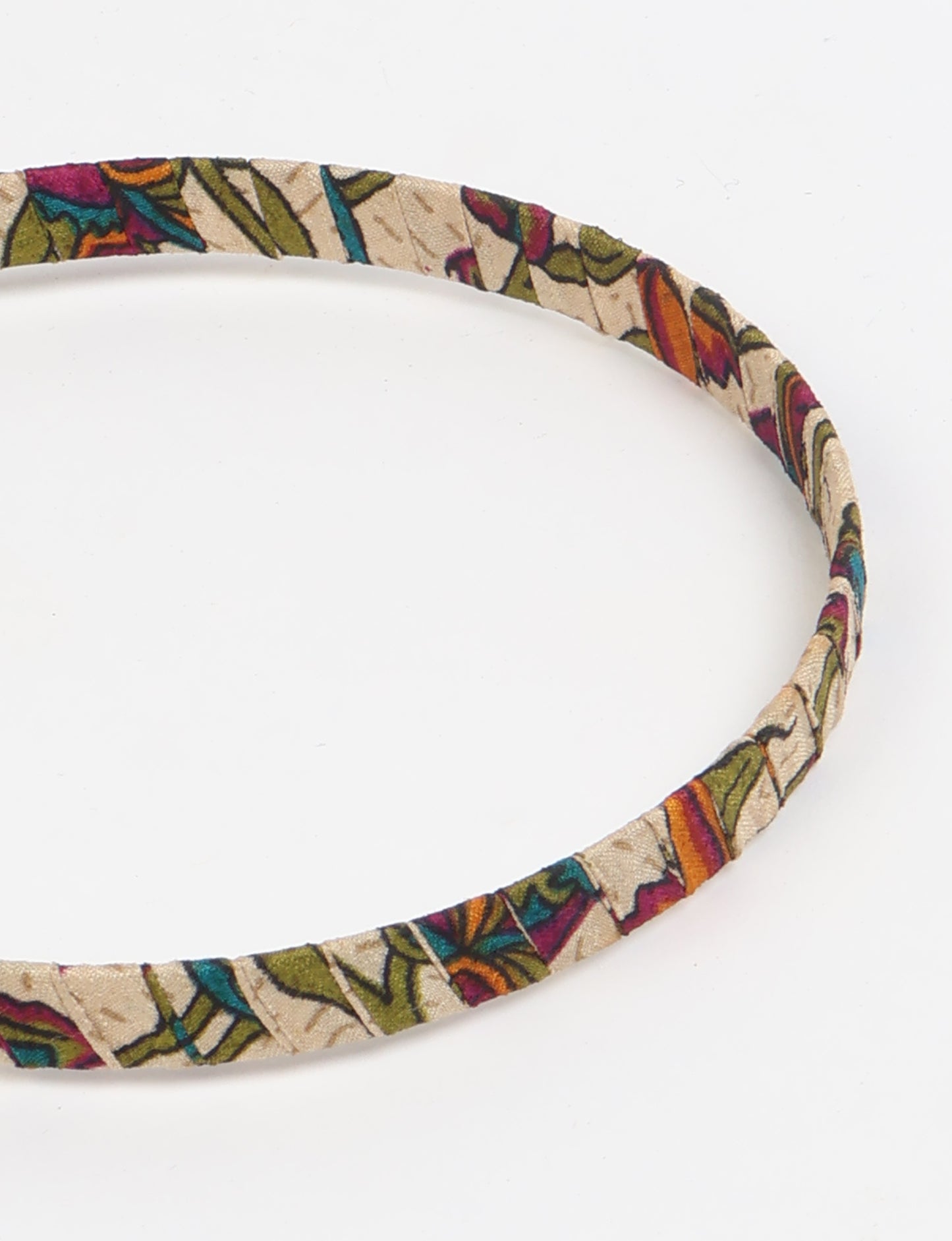 Thin fabric-wrapped metal hairband for a clean and stylish everyday look