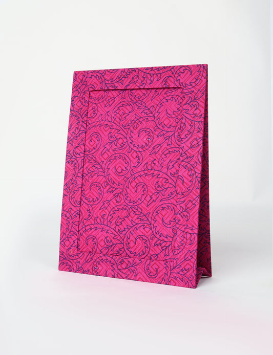 A4 size fabric photo frame with fold-out stand, made using upcycled clothing and recycled fashion concepts. Ideal for showcasing pictures, this eco friendly cloth-inspired frame highlights conscious clothing, zero waste clothing, and the essence of slow fashion.