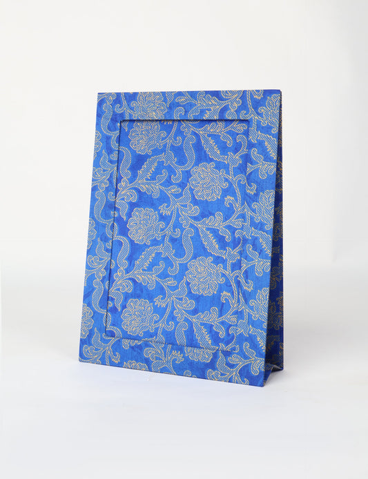 A4 size fabric photo frame with fold-out stand, made using upcycled clothing and recycled fashion concepts. Ideal for showcasing pictures, this eco friendly cloth-inspired frame highlights conscious clothing, zero waste clothing, and the essence of slow fashion.