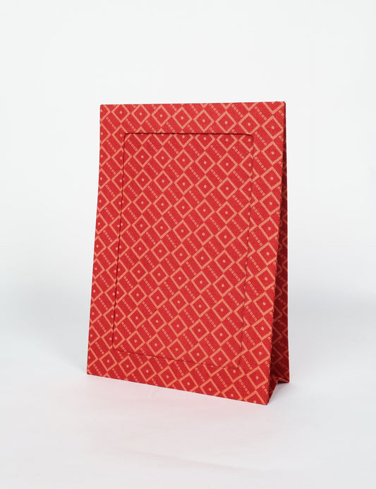 A4 size fabric photo frame with fold-out stand, made using upcycled clothing and recycled fashion concepts. Ideal for showcasing pictures, this eco friendly cloth-inspired frame highlights conscious clothing, zero waste clothing, and the essence of slow fashion.