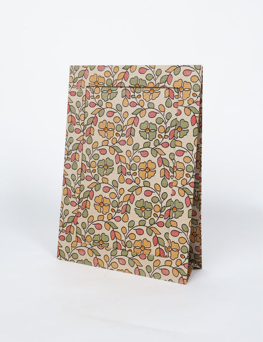 A4 size fabric photo frame with fold-out stand, made using upcycled clothing and recycled fashion concepts. Ideal for showcasing pictures, this eco friendly cloth-inspired frame highlights conscious clothing, zero waste clothing, and the essence of slow fashion.