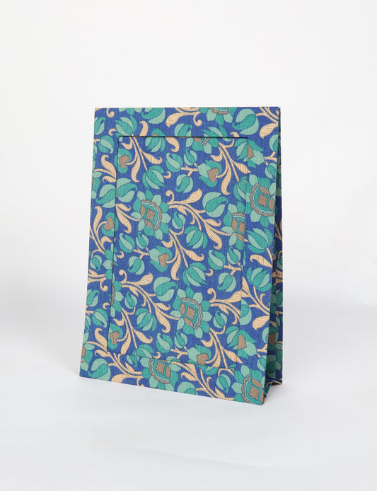 A4 size fabric photo frame with fold-out stand, made using upcycled clothing and recycled fashion concepts. Ideal for showcasing pictures, this eco friendly cloth-inspired frame highlights conscious clothing, zero waste clothing, and the essence of slow fashion.