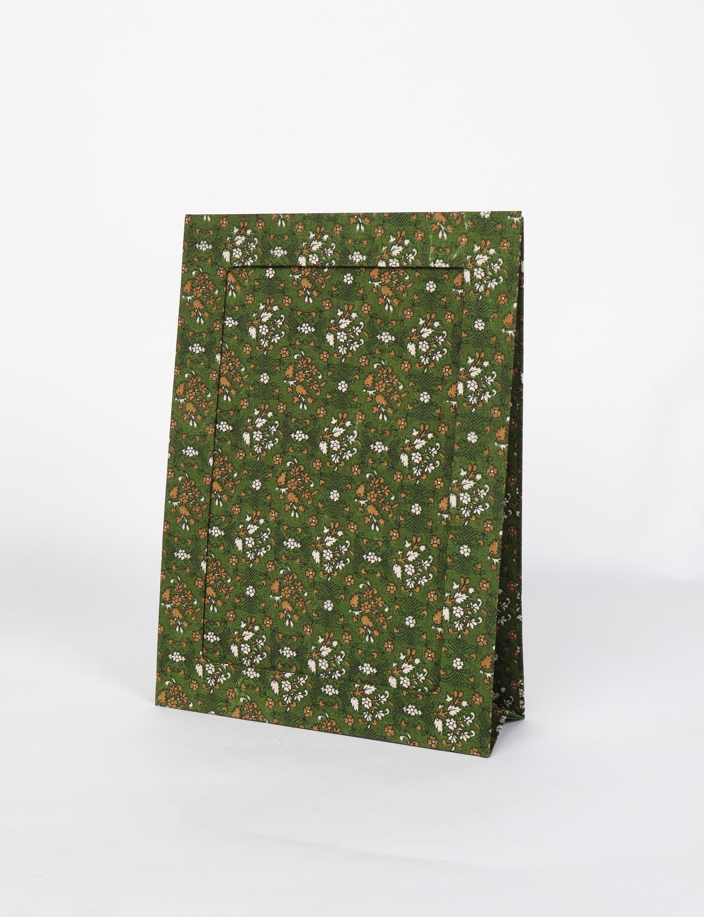 A4 size fabric photo frame with fold-out stand, made using upcycled clothing and recycled fashion concepts. Ideal for showcasing pictures, this eco friendly cloth-inspired frame highlights conscious clothing, zero waste clothing, and the essence of slow fashion.