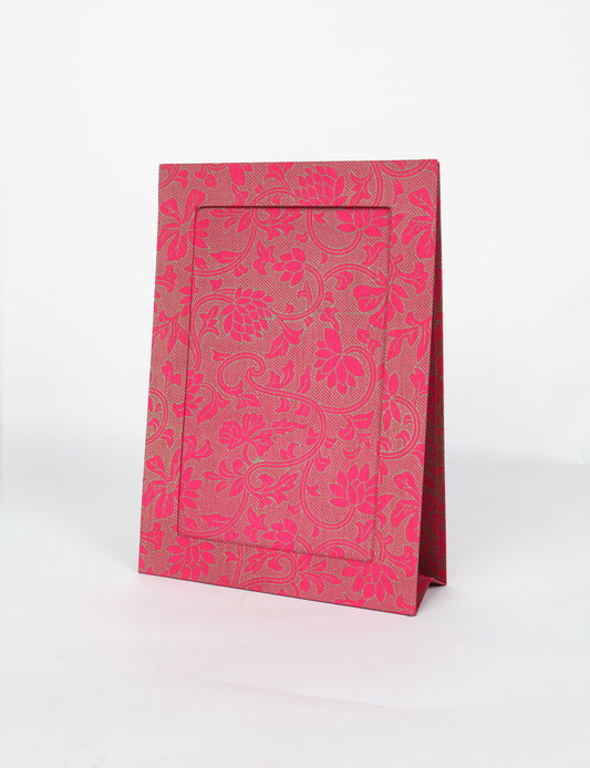 A4 size fabric photo frame with fold-out stand, made using upcycled clothing and recycled fashion concepts. Ideal for showcasing pictures, this eco friendly cloth-inspired frame highlights conscious clothing, zero waste clothing, and the essence of slow fashion.