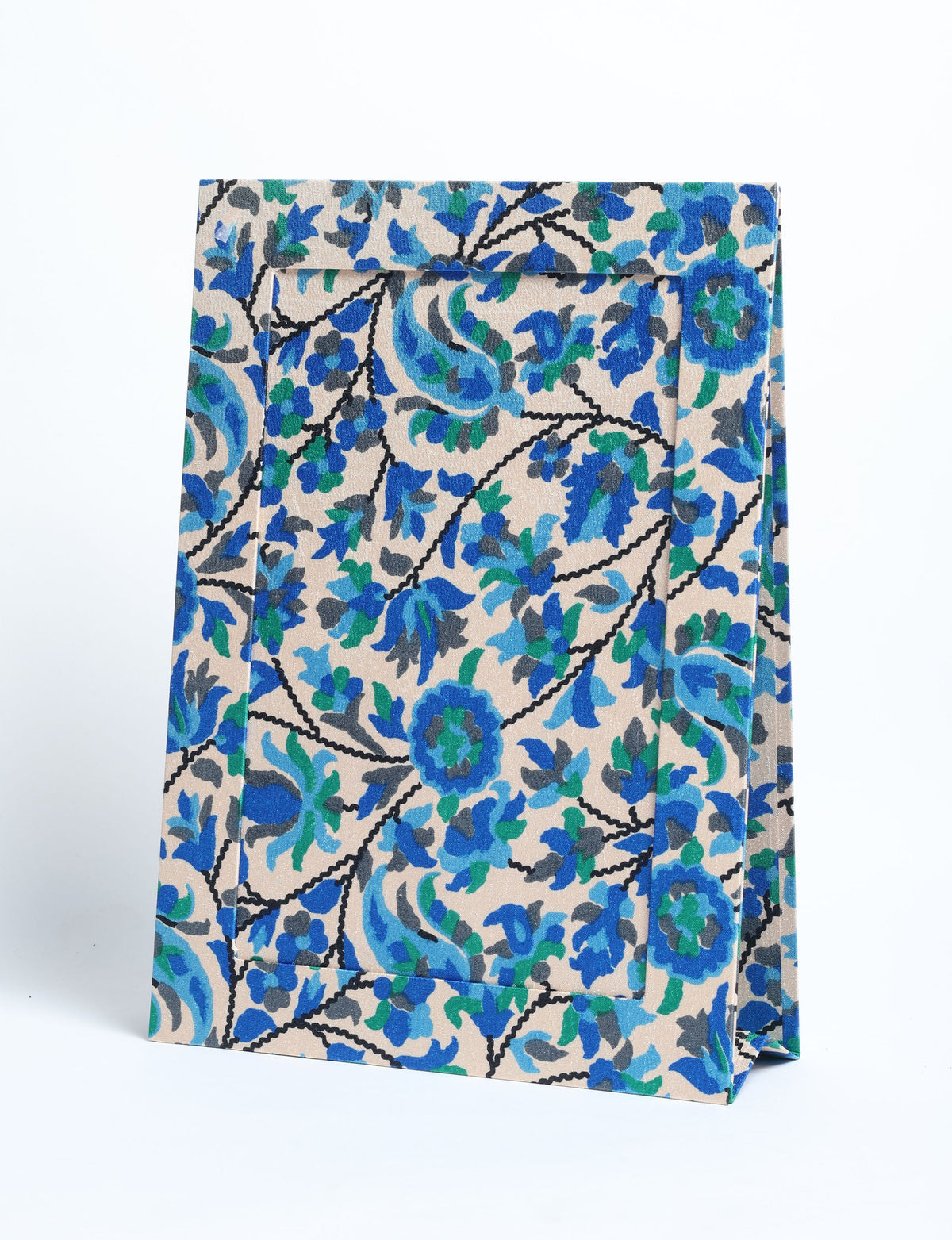 Beige tropical patterned photo frame with blue and green floral design, shown standing at an angle on white background
